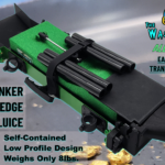 A green and black gun with a caption that says " tanker dredge sluice ".