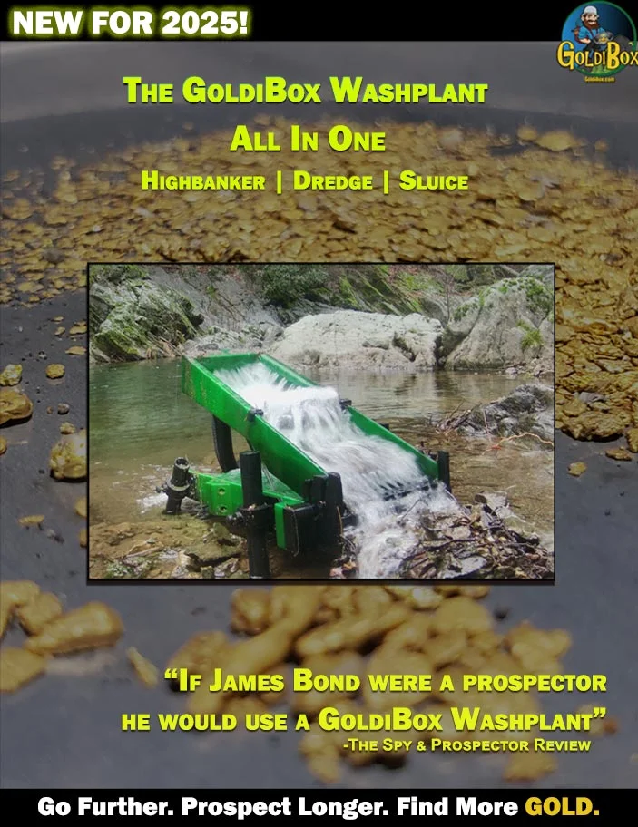 A green machine in the middle of a muddy river.